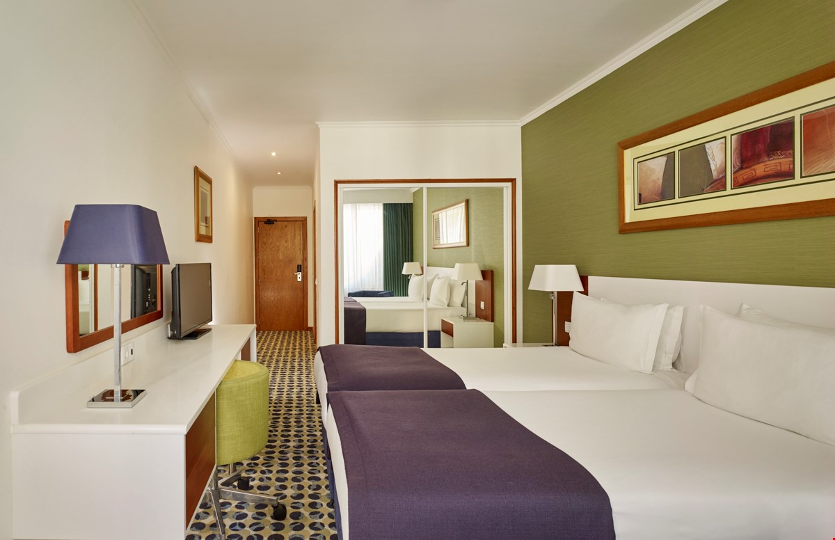 Hotel Armação de Pêra Portugal nomad remote 79beb381-8b88-4154-95c9-165f1af12f3d_Twin Landview Room.jpg